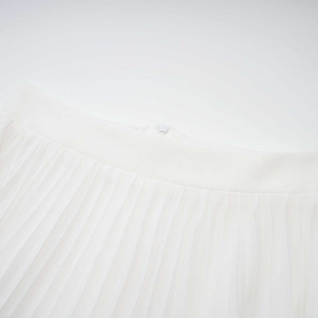 Vestido largo en capas con escote halter de Inés.
