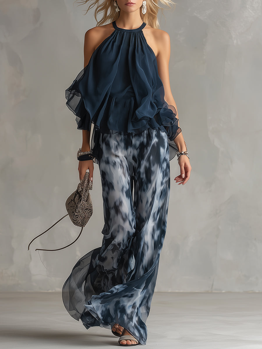 Ludovica - elegante en chiffon con top de cuello alto y pantalones anchos estampados