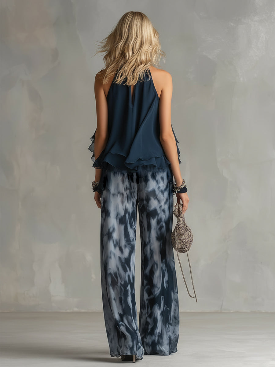 Ludovica - elegante en chiffon con top de cuello alto y pantalones anchos estampados