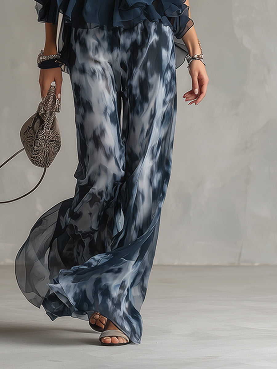 Ludovica - elegante en chiffon con top de cuello alto y pantalones anchos estampados